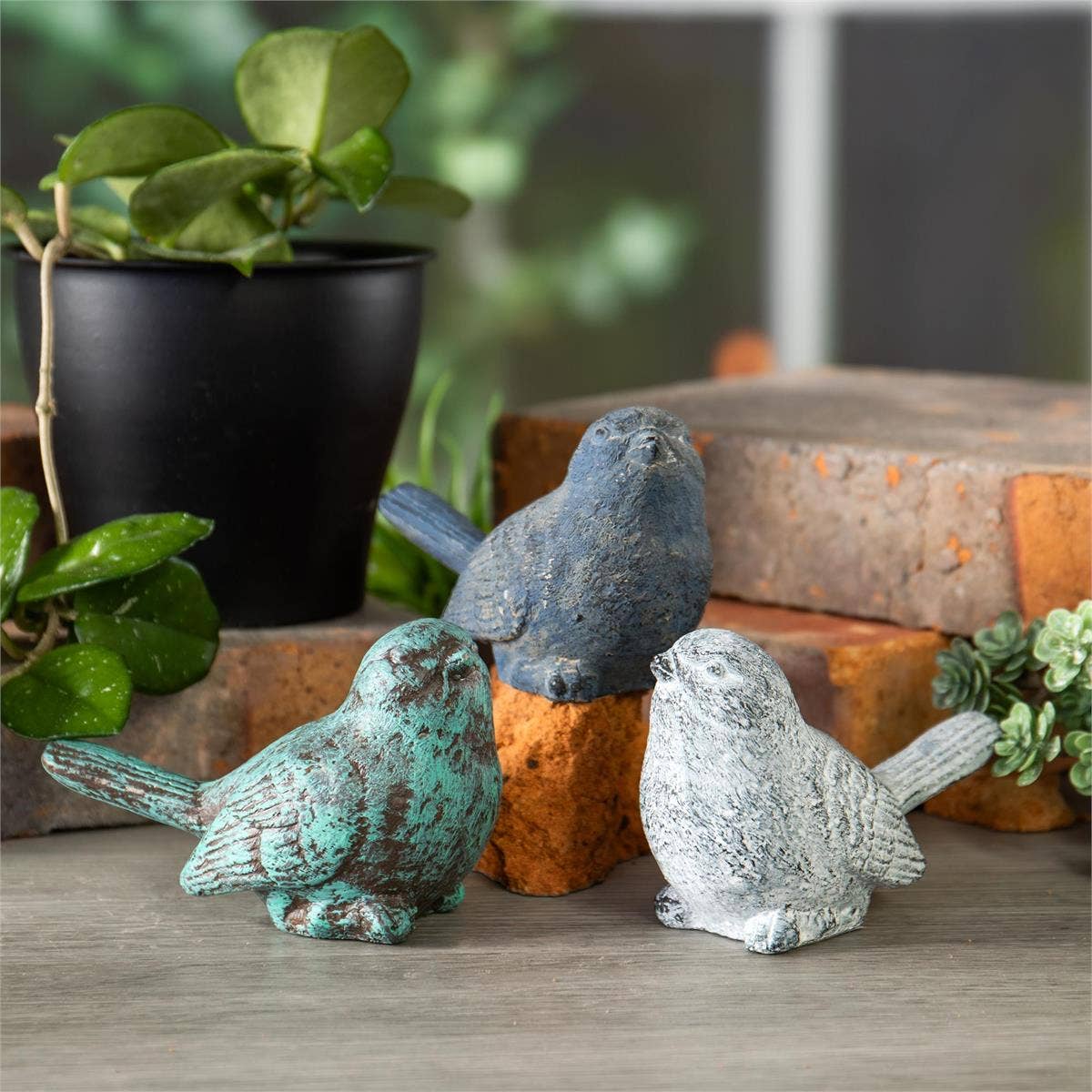 Blue-Gray Weathered Cement Bird Figurine