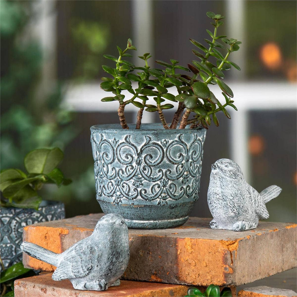 Blue-Gray Weathered Cement Bird Figurine