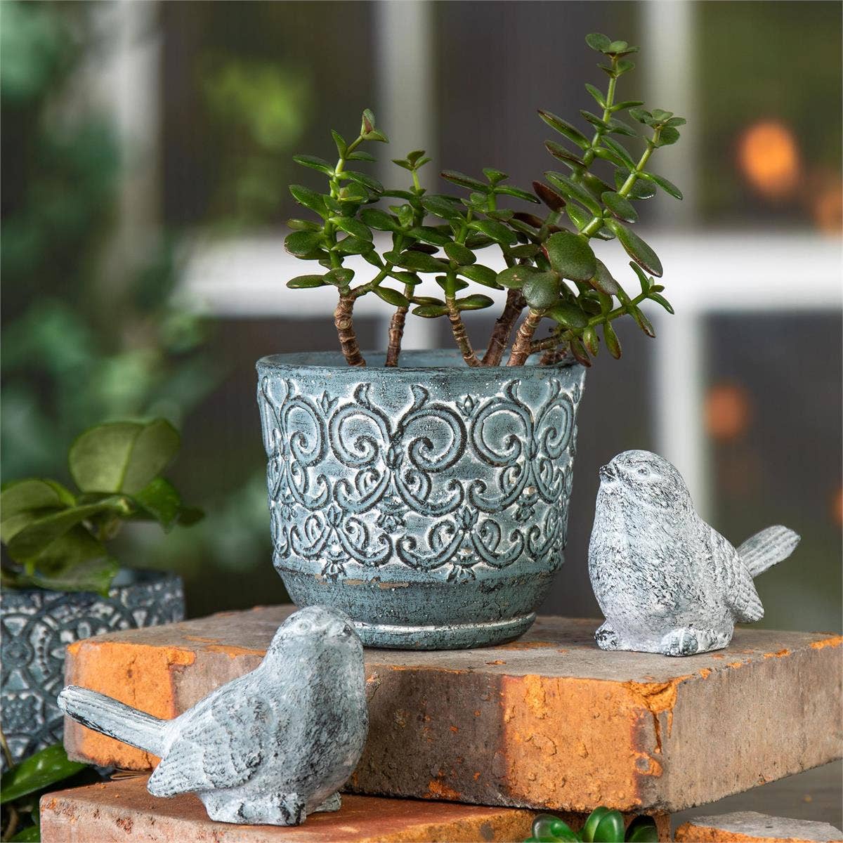 Blue-Gray Weathered Cement Bird Figurine